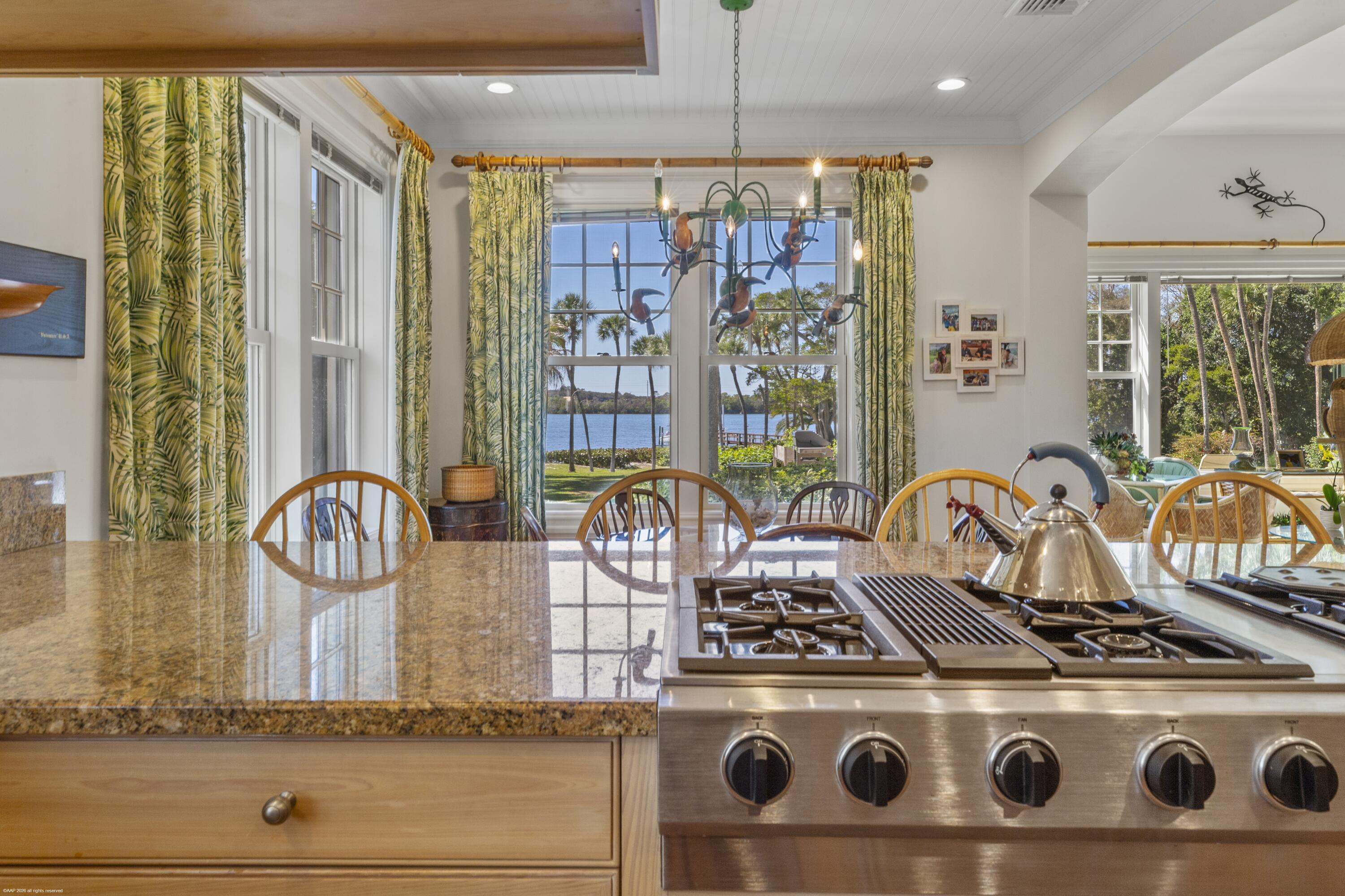228 South Beach Road Jupiter Island, FL 33455 - Photo 17 of 40 a stove top oven sitting inside of a kitchen