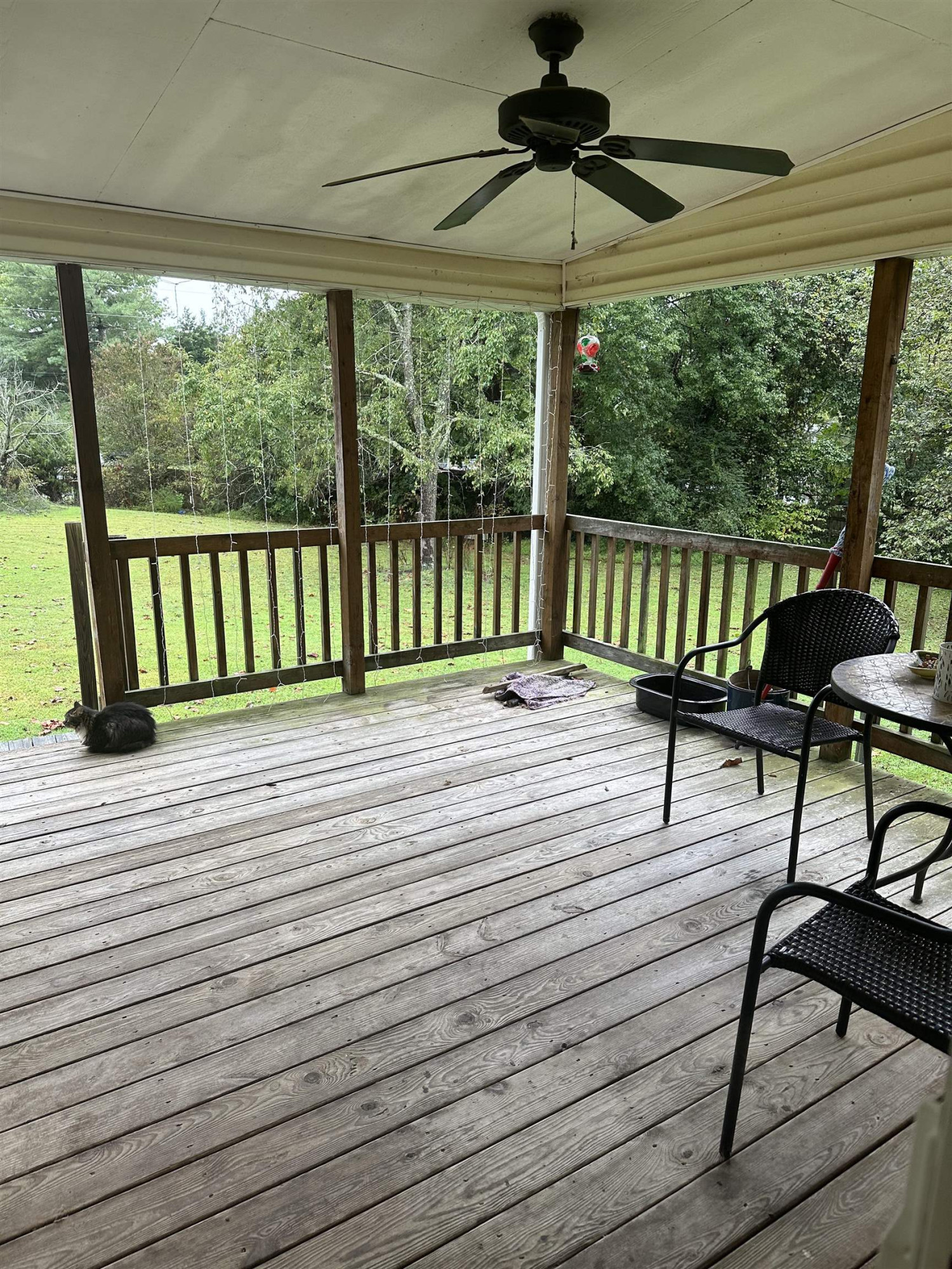 440 Lester Burch Road Roxboro, NC 27574 - Photo 3 of 7 a view of a balcony with furniture