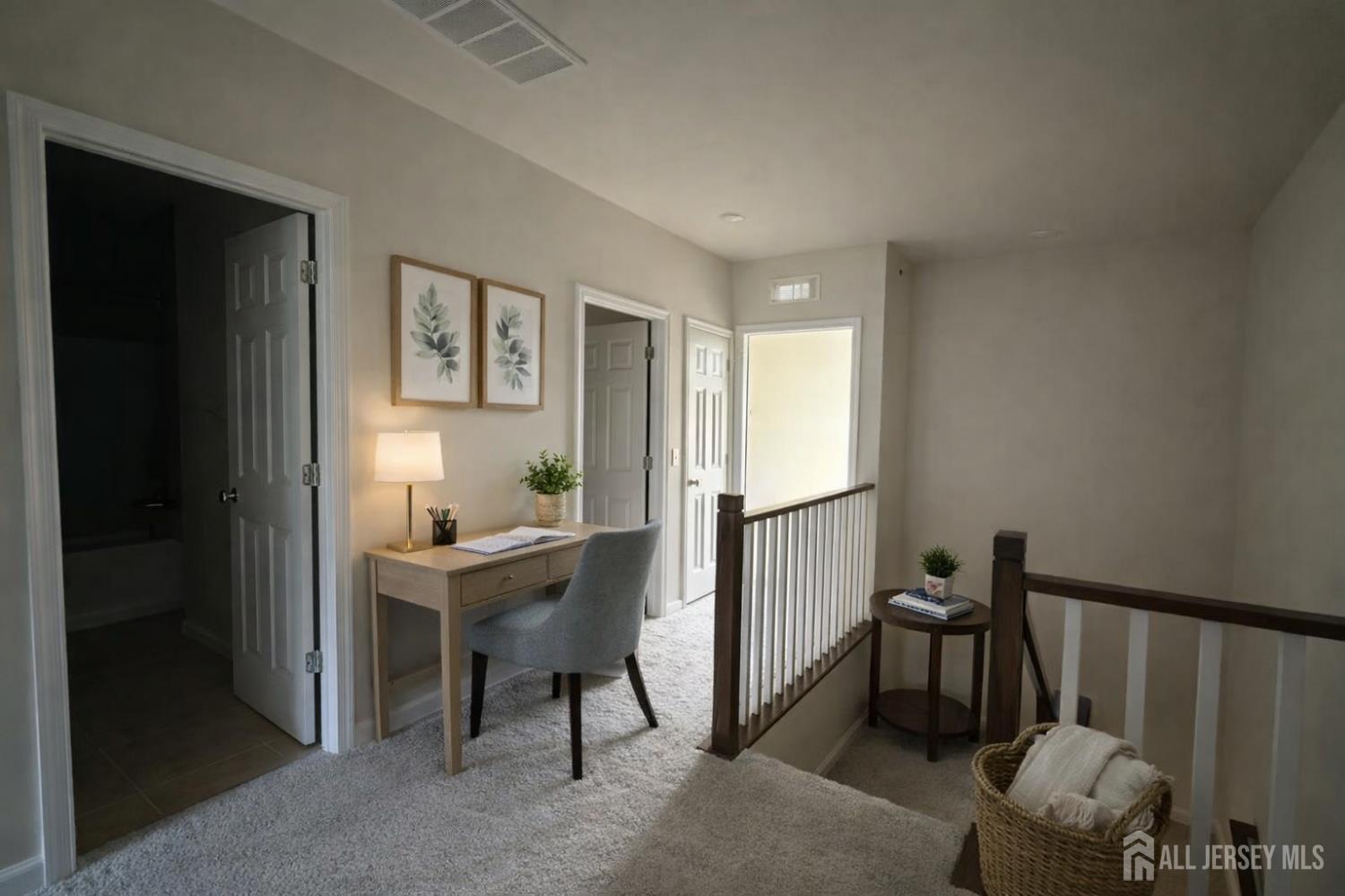 616 Sadie Circle New Brunswick, NJ 08901 - Photo 10 of 18 a view of a workspace with furniture and a window