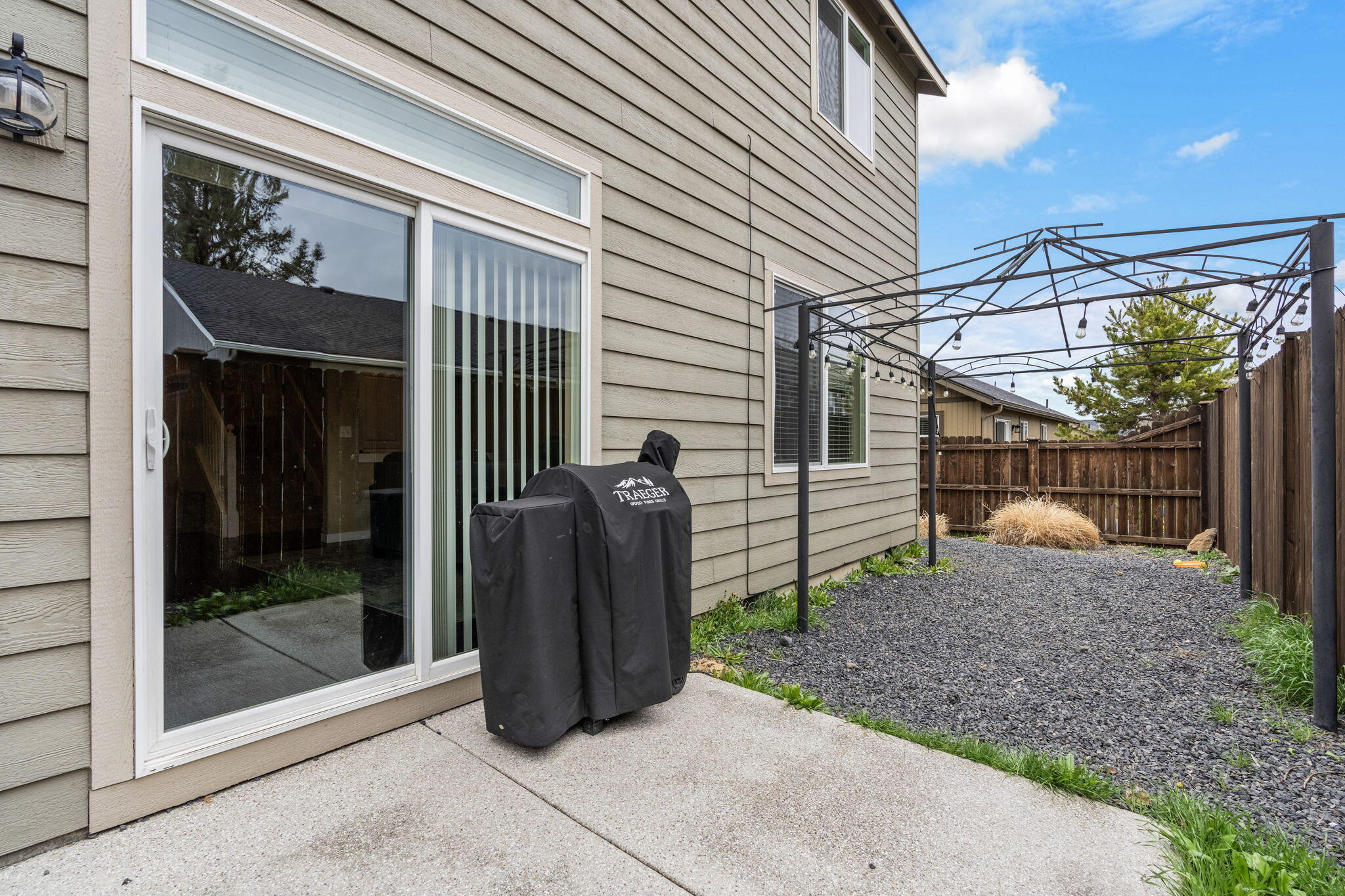 2781 Northeast Spring Water Place Bend, OR 97701 - Photo 16 of 23 a view of a house with backyard and porch