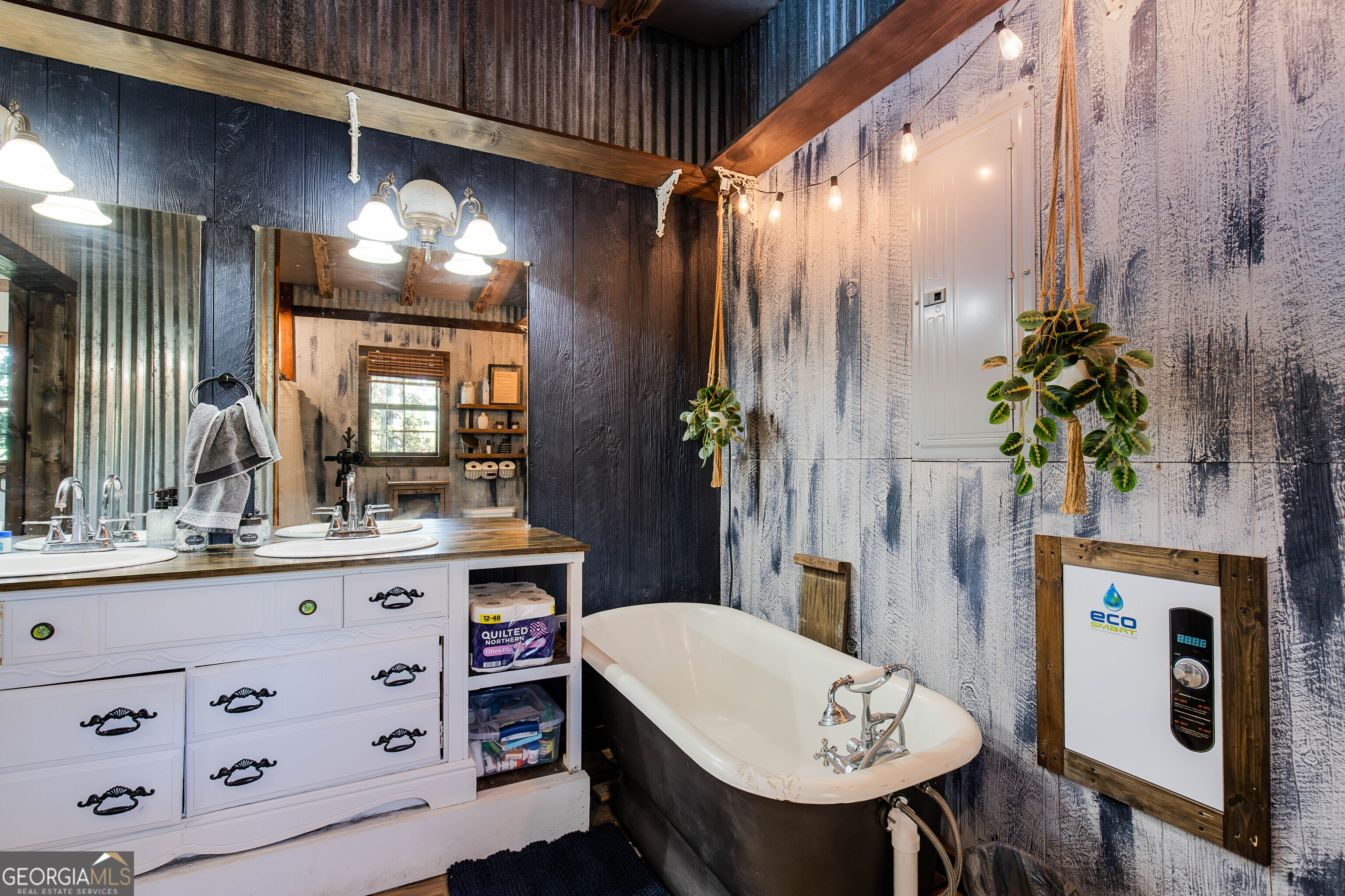2286 Carter Bight Landing Road Surrency, GA 31563 - Photo 2 of 35 a bathroom with a sink and a mirror