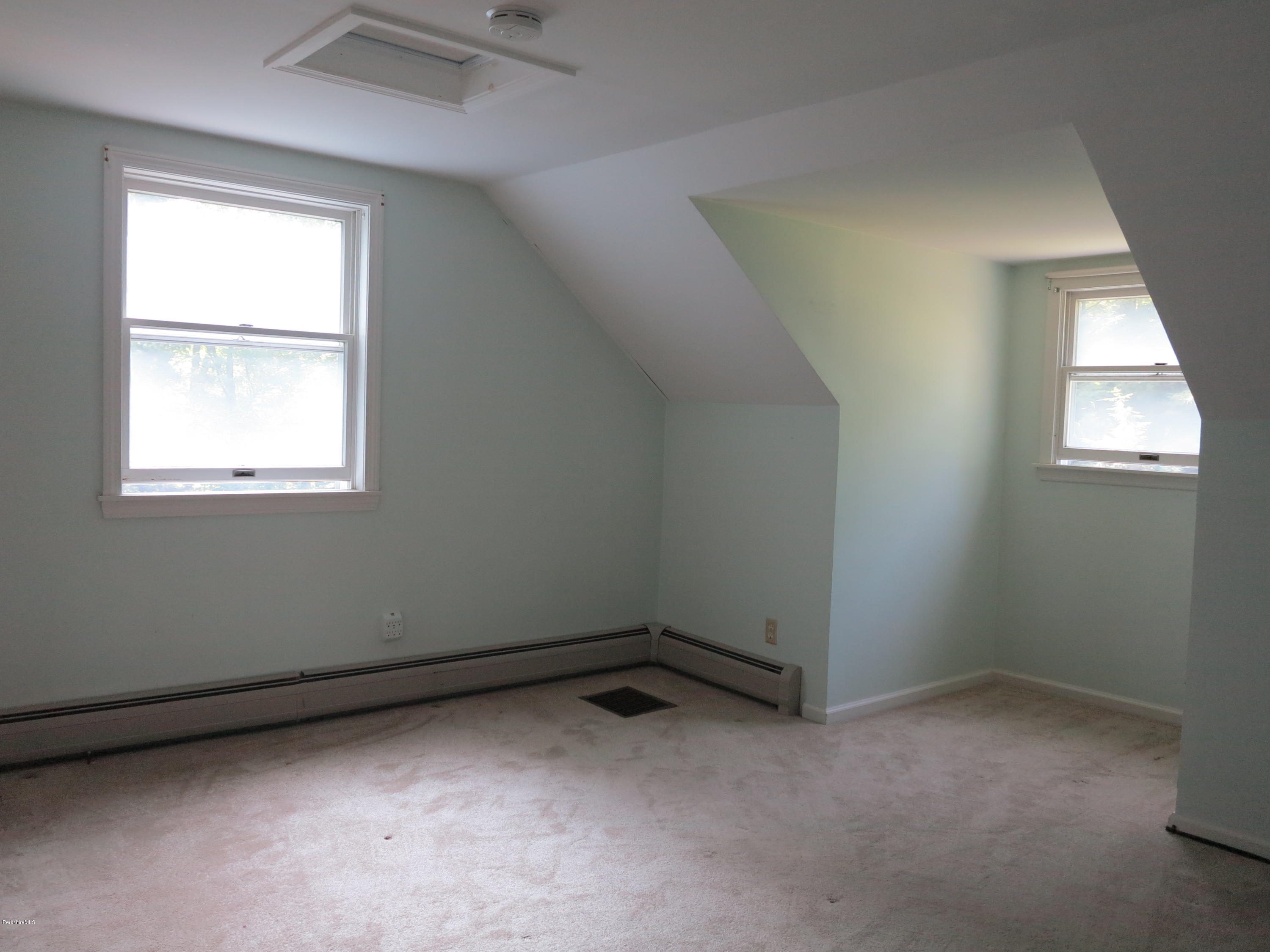 98 Tyringham Road Otis, MA 01253 - Photo 8 of 17 an empty room with a window