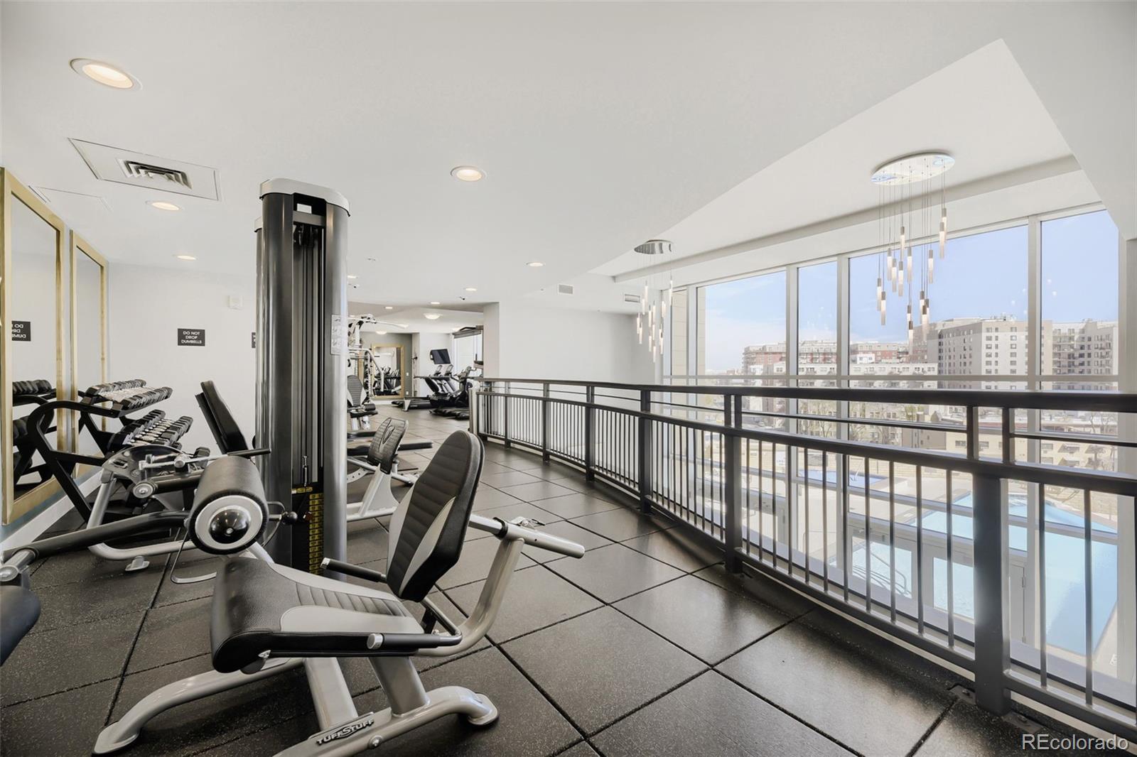 2001 Lincoln Street, Unit 710 Denver, CO 80202 - Photo 21 of 27 a view of a room with gym equipment