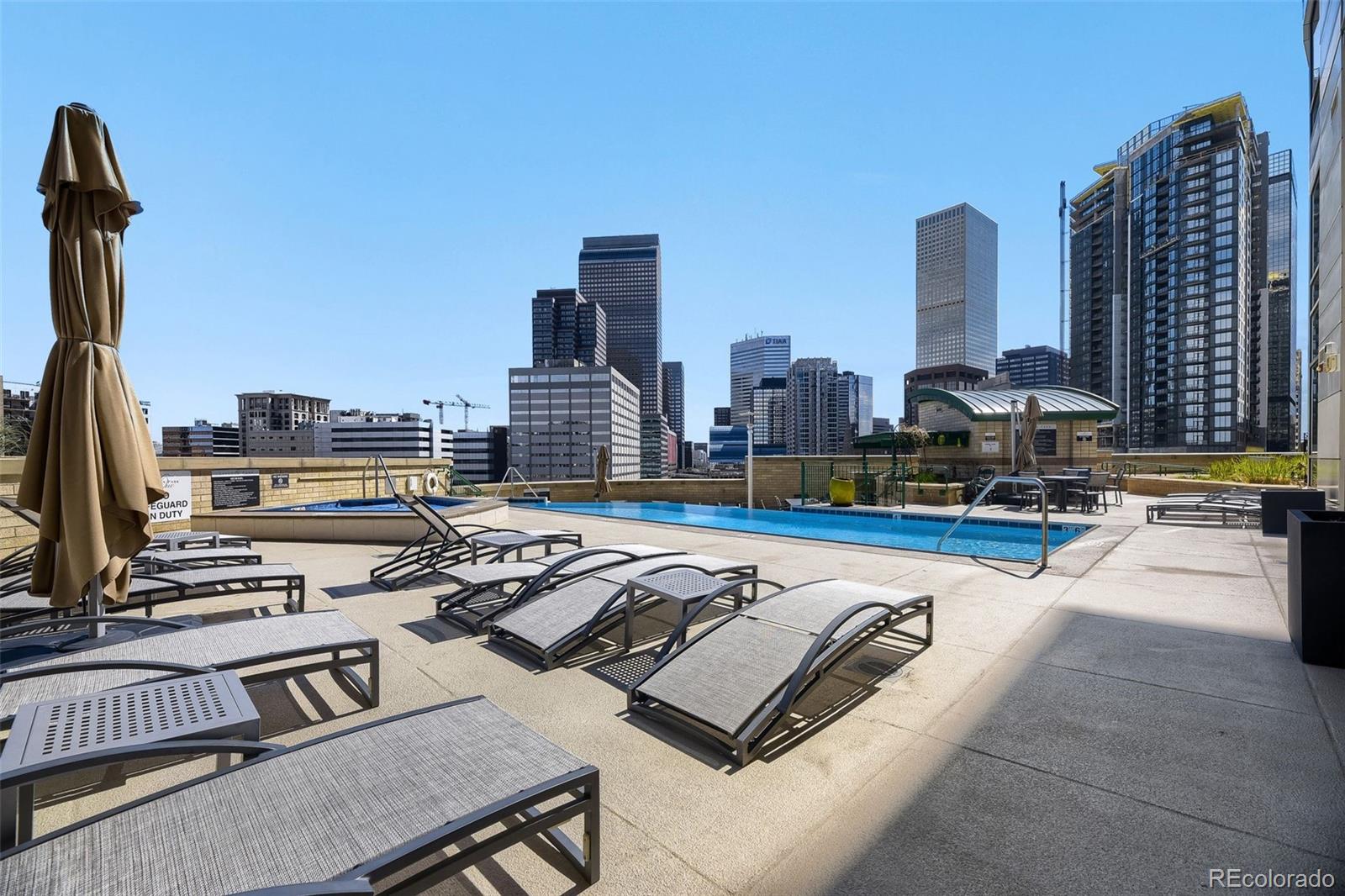 2001 Lincoln Street, Unit 710 Denver, CO 80202 - Photo 25 of 27 a view of a terrace with chairs