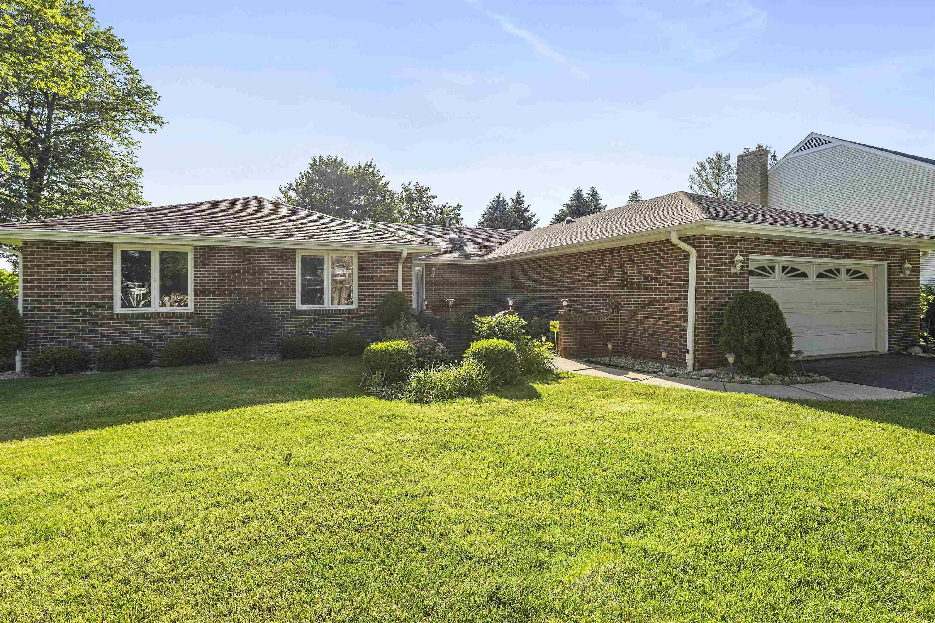 1732 Rowntree Lane Rockford, IL 61107 - Photo 1 of 26 a view of a house with a yard