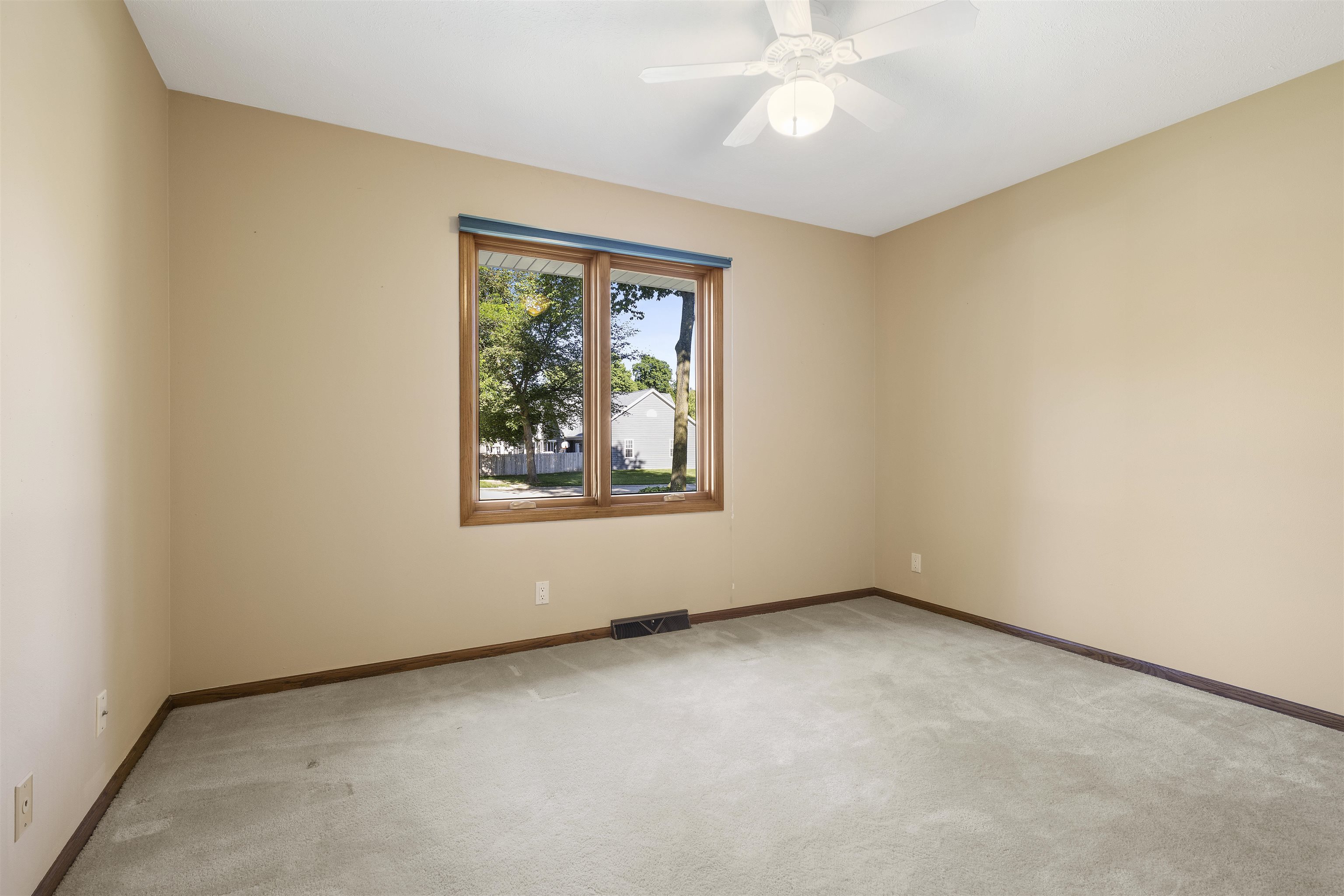 1732 Rowntree Lane Rockford, IL 61107 - Photo 13 of 26 an empty room with windows and fan
