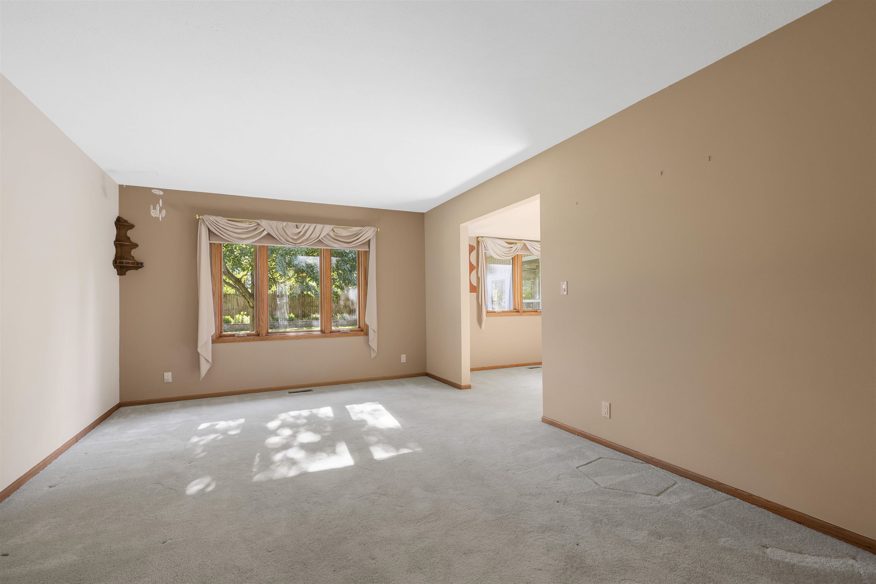 1732 Rowntree Lane Rockford, IL 61107 - Photo 2 of 26 an empty room with windows