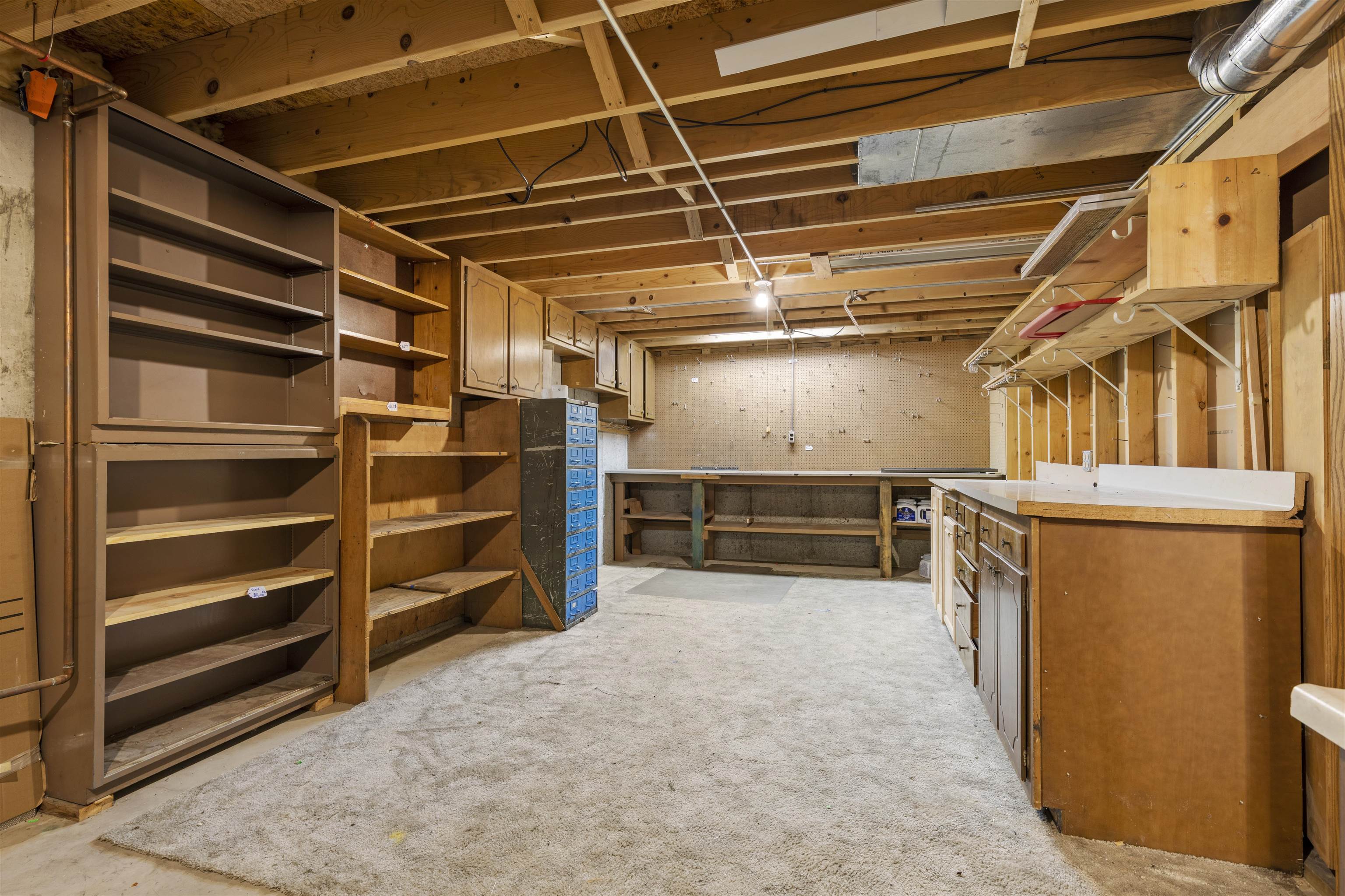 1732 Rowntree Lane Rockford, IL 61107 - Photo 21 of 26 a view of walk in closet with empty racks