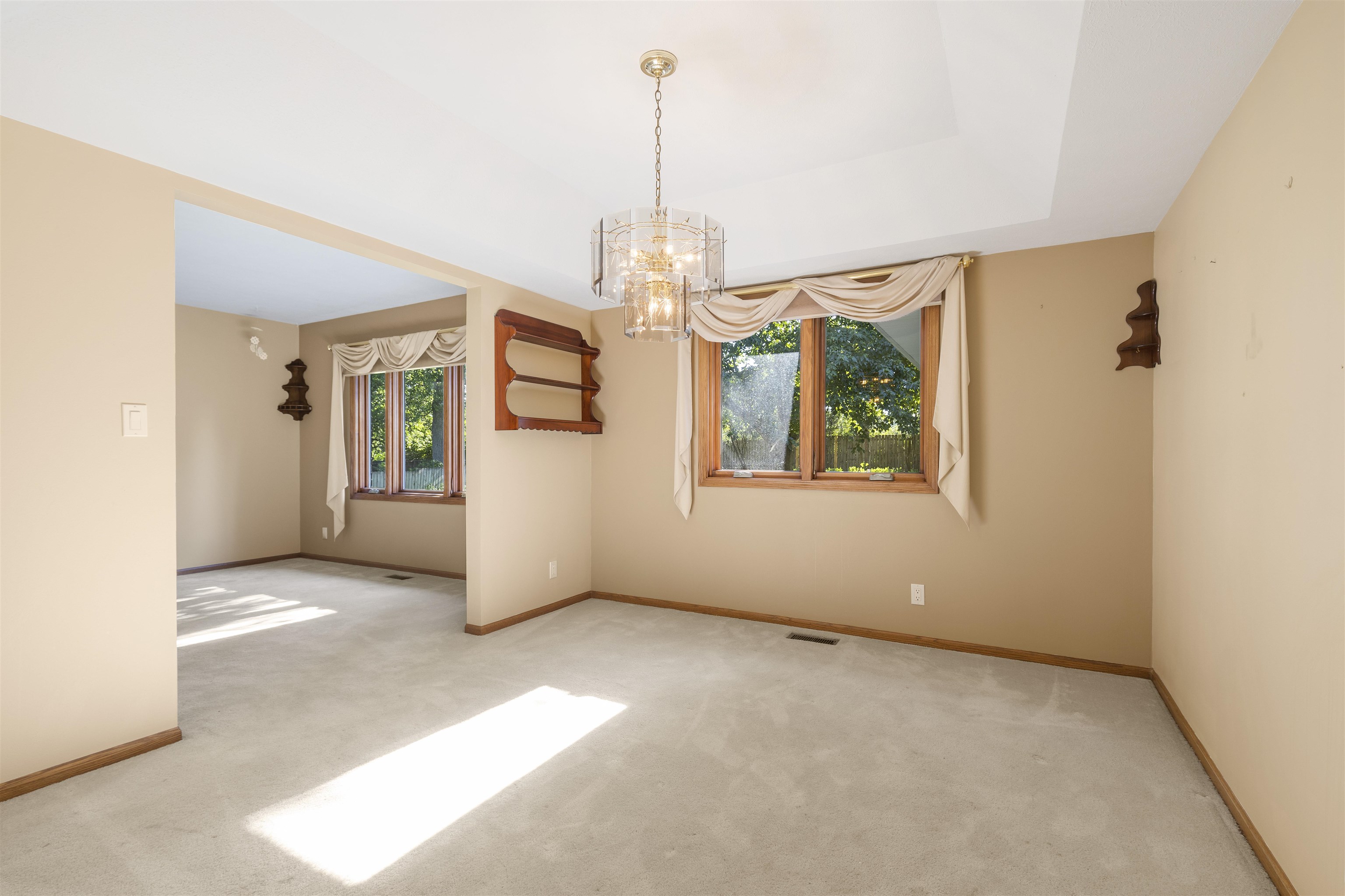 1732 Rowntree Lane Rockford, IL 61107 - Photo 3 of 26 an empty room with windows and entrance