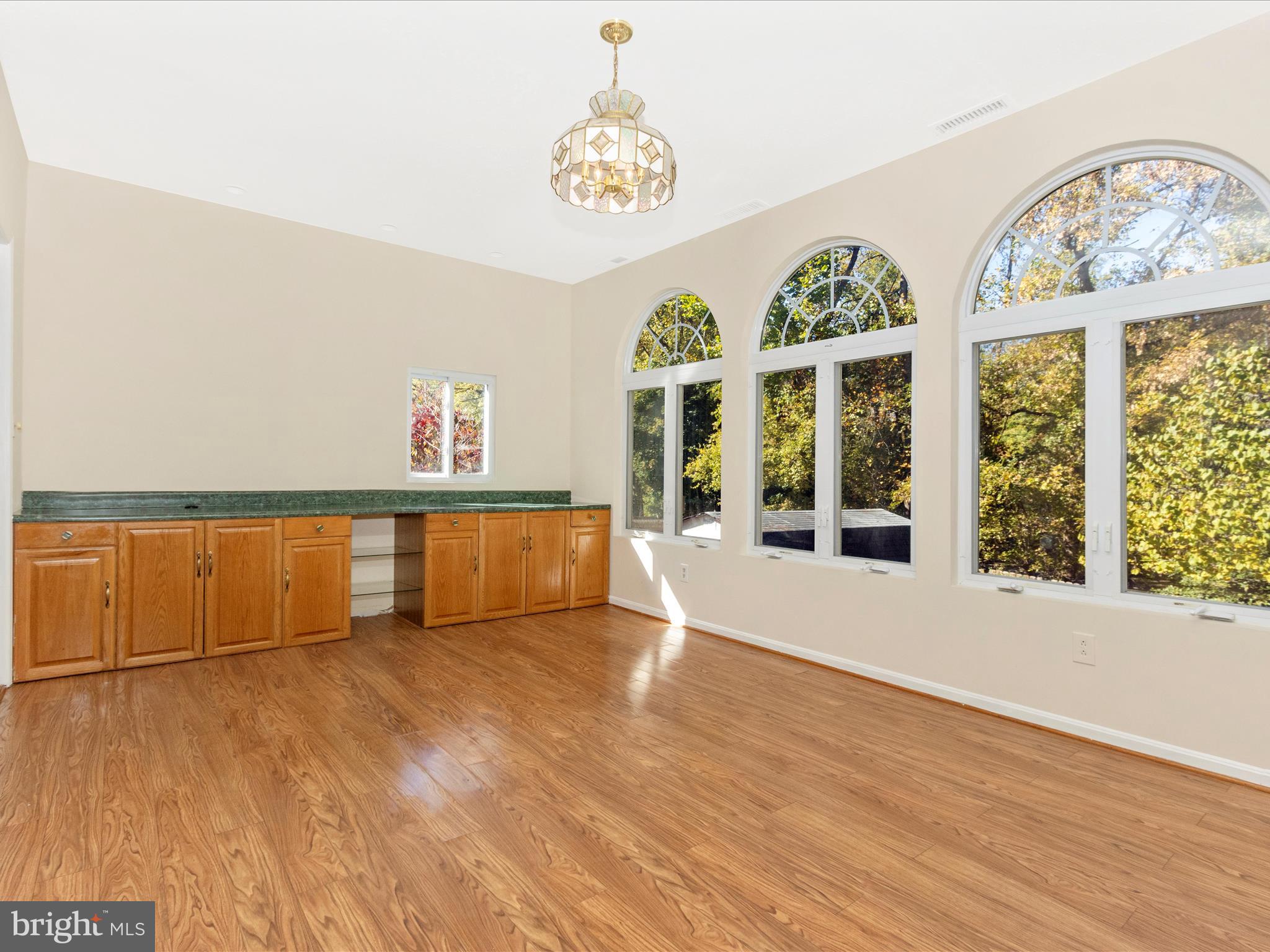 12844 Littleton Street Silver Spring, MD 20906 - Photo 12 of 43 Sundrenched sunroom with palladian windows
