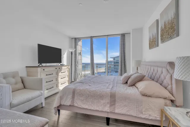 a living room with a glass door shower