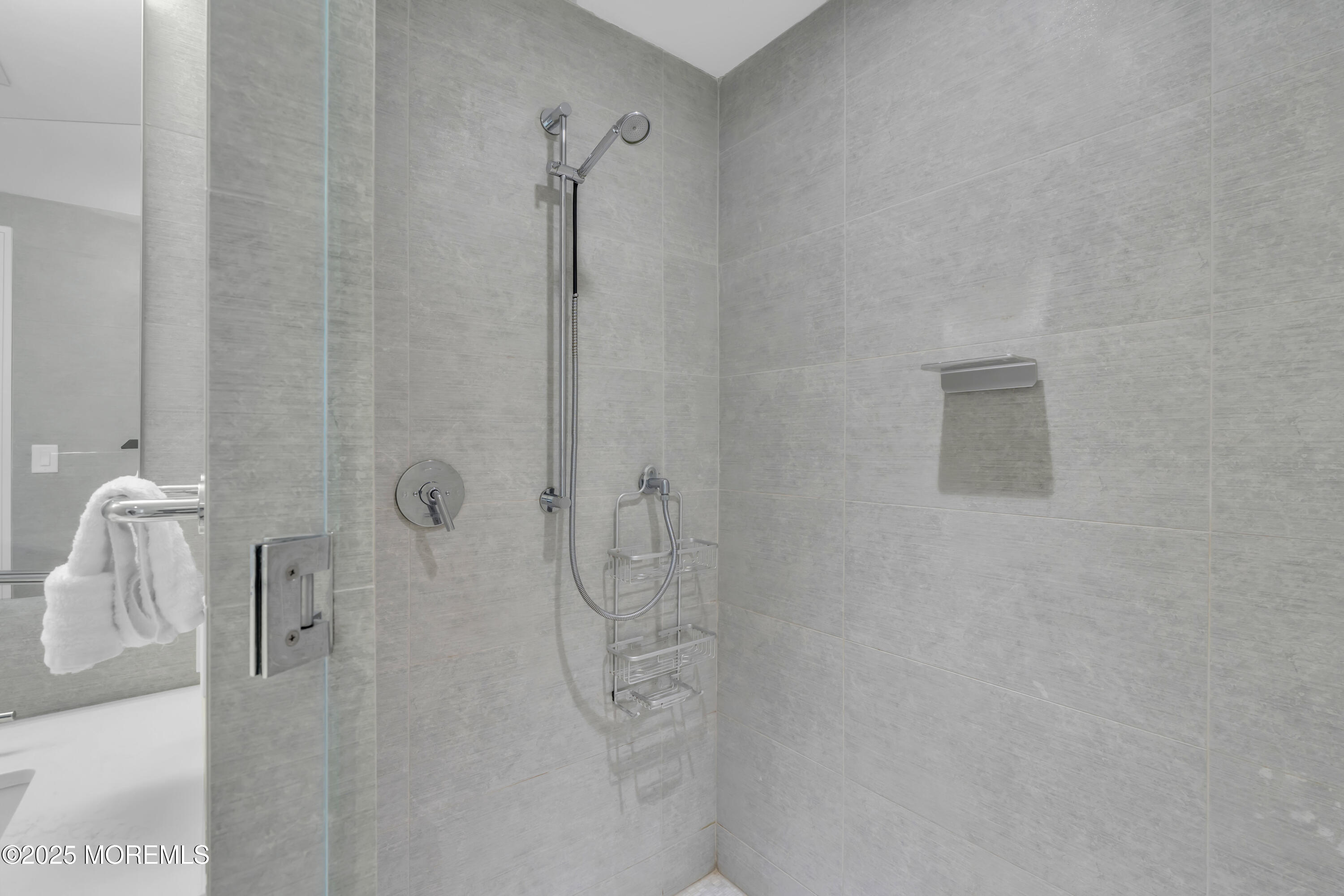 20 Melrose Terrace, Unit 509 Long Branch, NJ 07740 - Photo 16 of 24 a bathroom with a shower