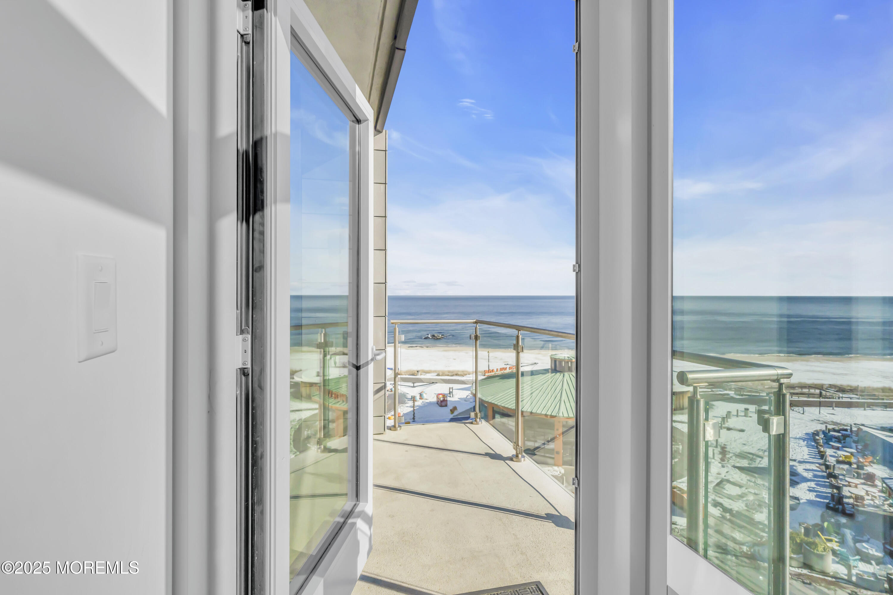 20 Melrose Terrace, Unit 509 Long Branch, NJ 07740 - Photo 8 of 24 a view of a balcony with lake view