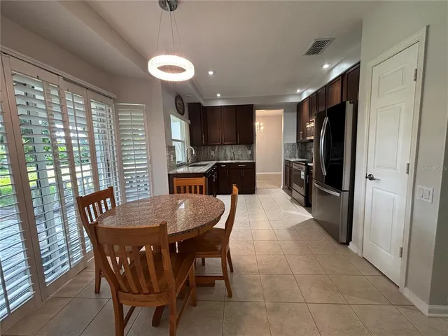 a bathroom with a sink toilet and mirror