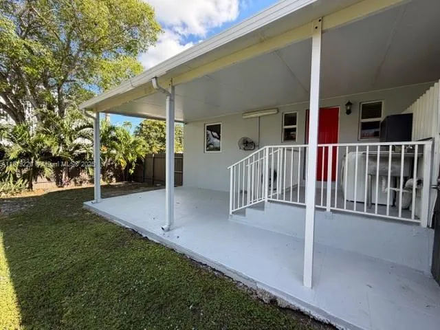 a view of a room with washer and dryer