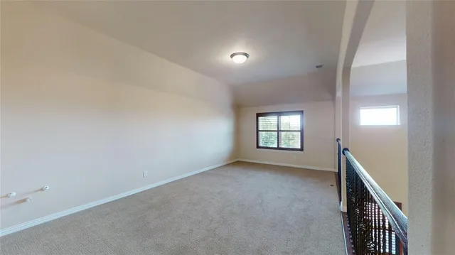 a kitchen with stainless steel appliances granite countertop wooden cabinets and a sink