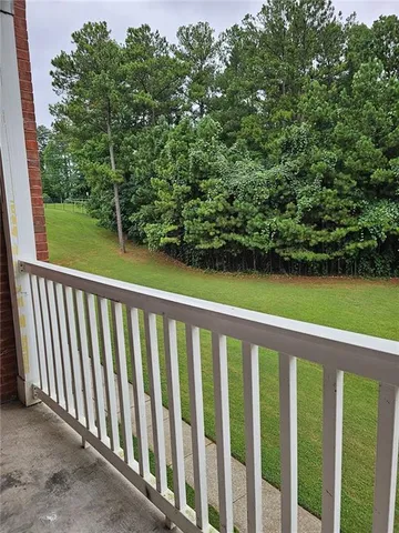 a view of a balcony with outdoor space