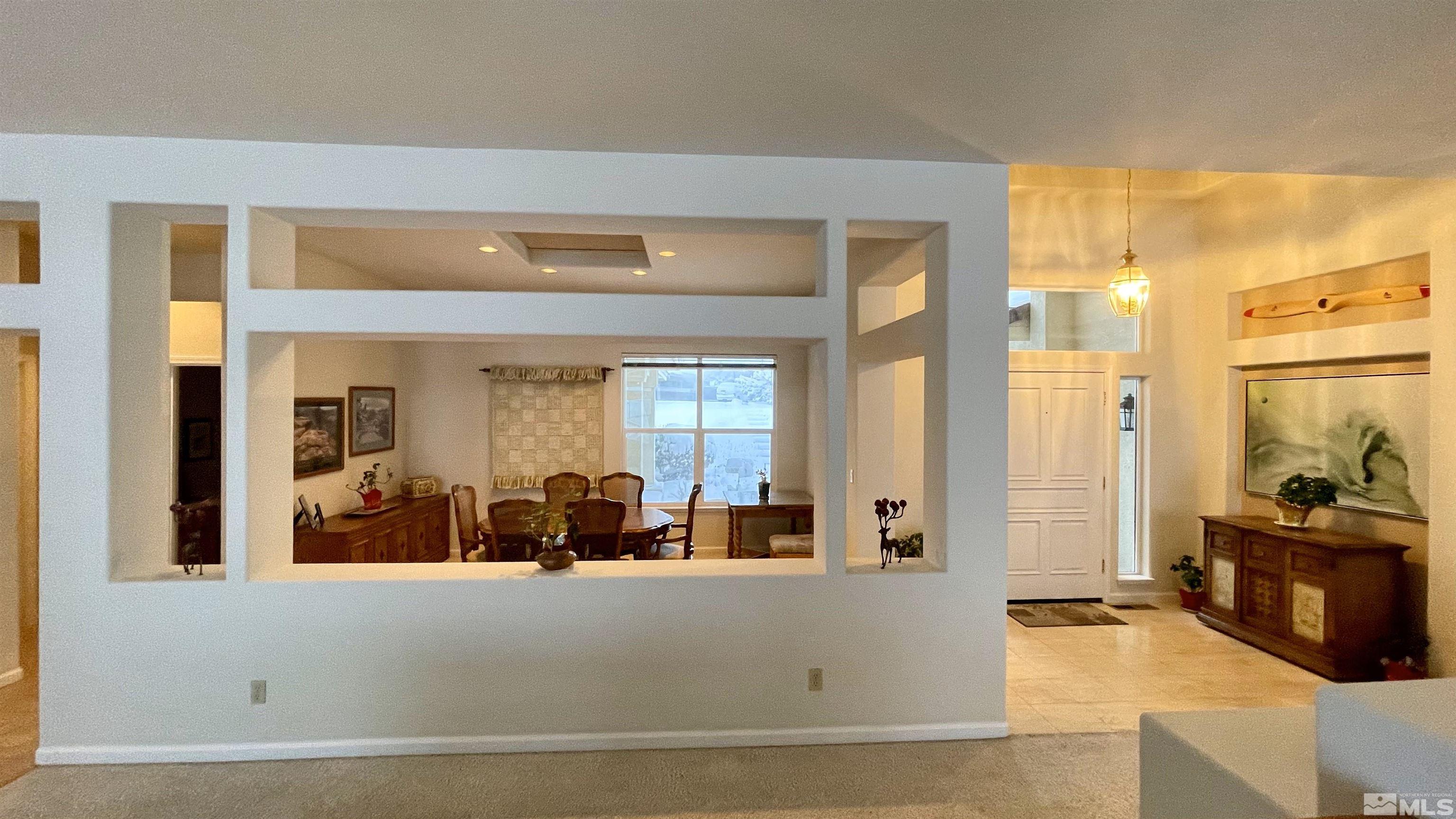 5120 West Acoma Road Reno, NV 89511 - Photo 24 of 39 a view of living room filled with furniture and large windows