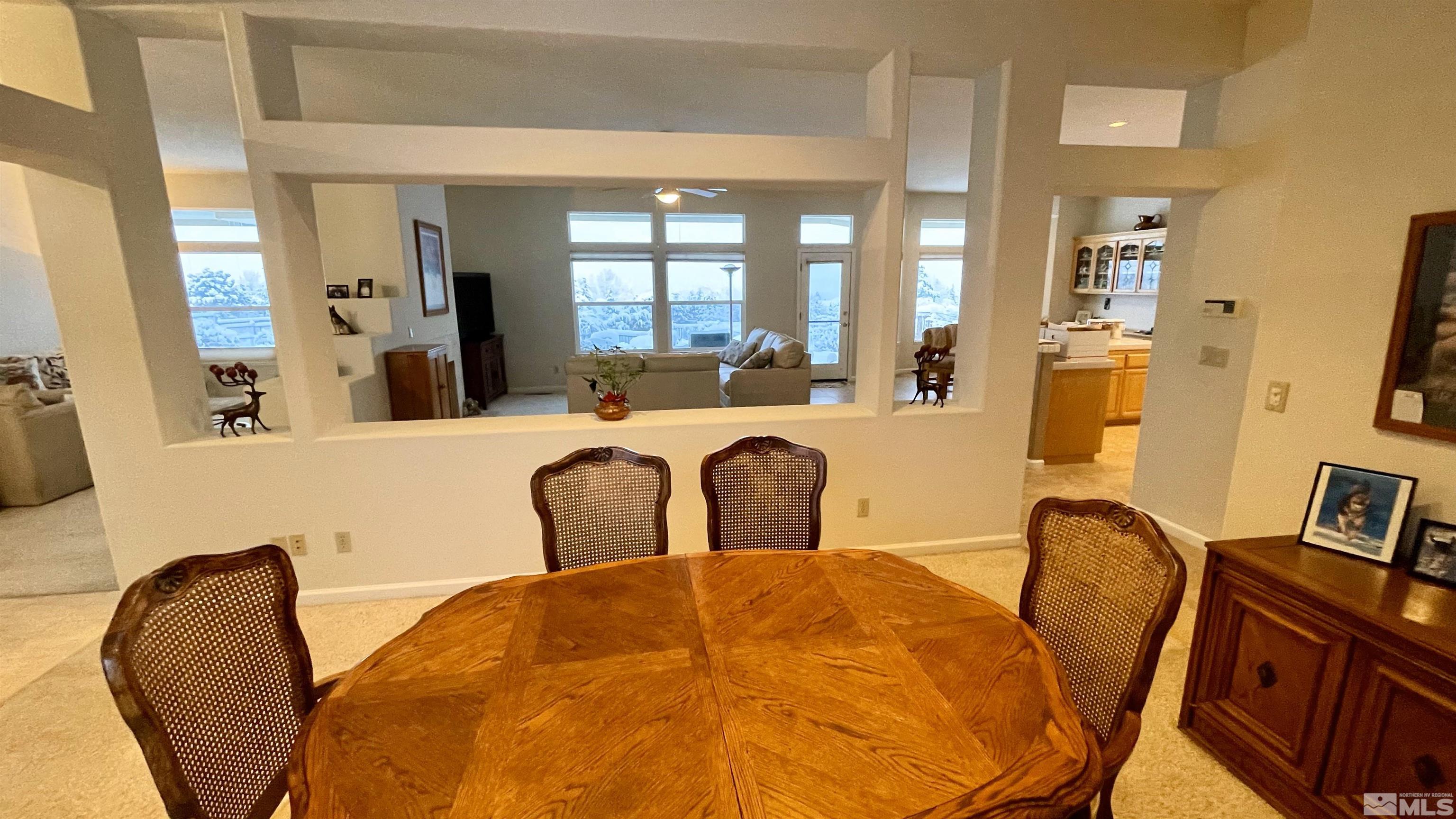 5120 West Acoma Road Reno, NV 89511 - Photo 26 of 39 a bedroom with furniture and a large mirror
