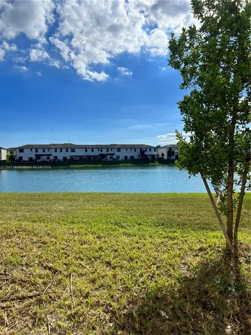 a view of an ocean and city