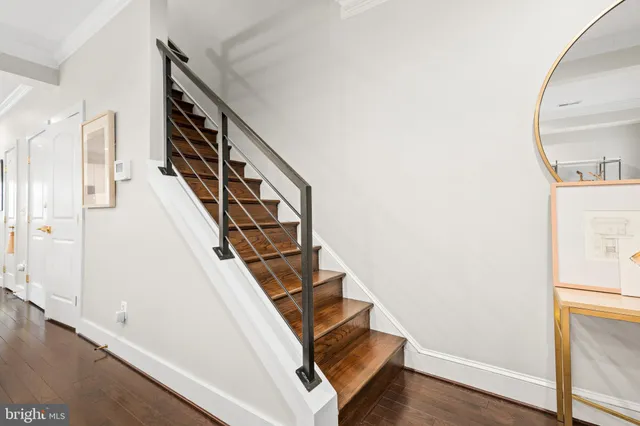 a view of entryway with wooden floor