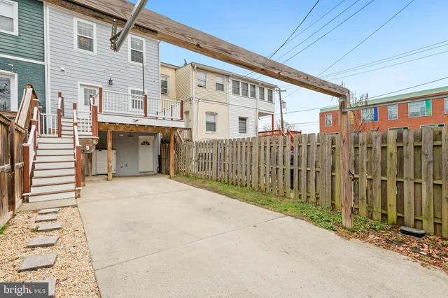 a front view of a house with parking