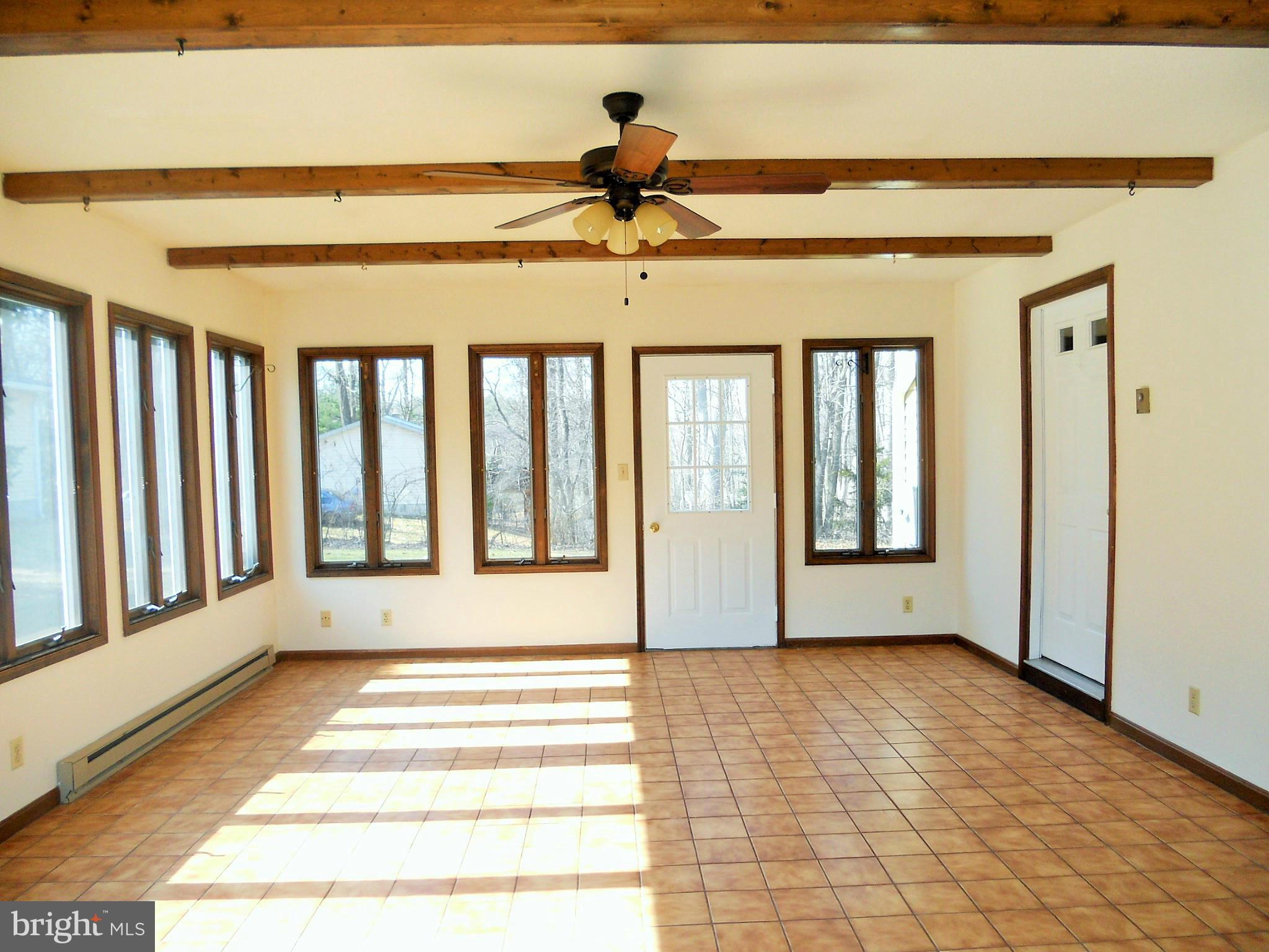 1418 Pinch Valley Road Westminster, MD 21158 - Photo 6 of 21 Sunroom brings the outdoors inside