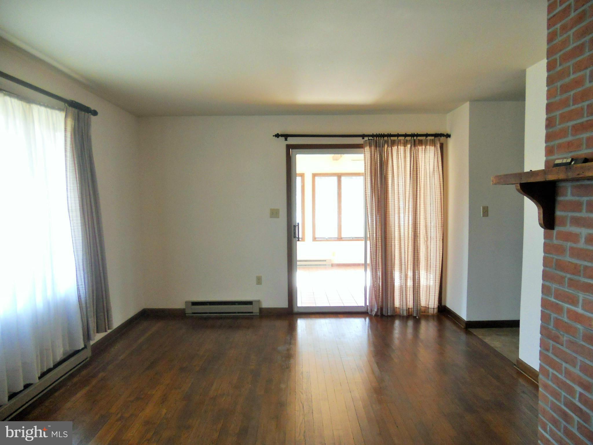 1418 Pinch Valley Road Westminster, MD 21158 - Photo 7 of 21 Living Room has real hardwood floors