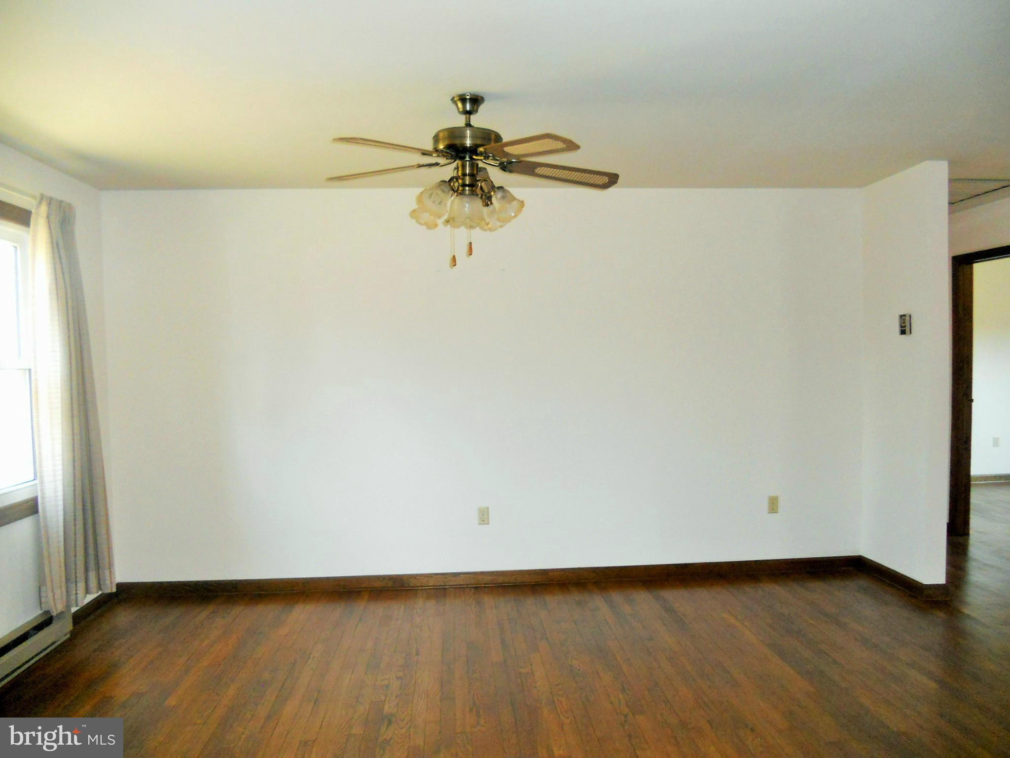 1418 Pinch Valley Road Westminster, MD 21158 - Photo 9 of 21 Dining Room has hardwood floors