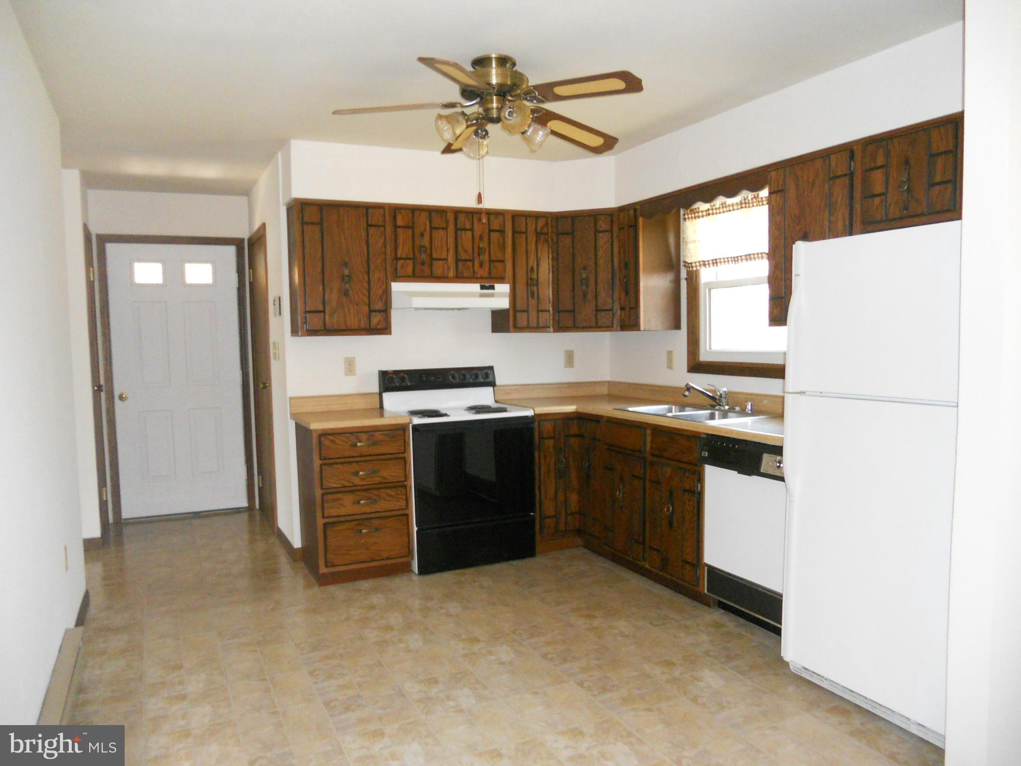 1418 Pinch Valley Road Westminster, MD 21158 - Photo 10 of 21 Kitchen with main level laundry room attached