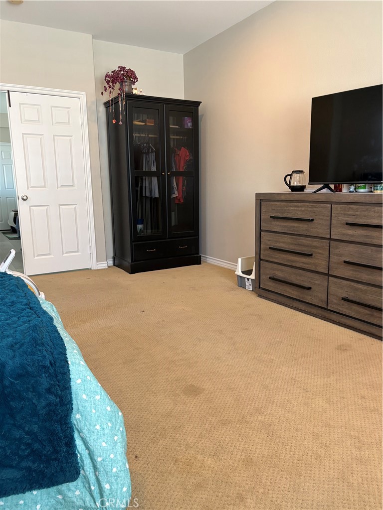17115 Noble View Circle Riverside, CA 92503 - Photo 45 of 53 Upstairs Bonus Room used as a Sixth Bedroom with two Armoire Cabinets to hang clothes, Etc.