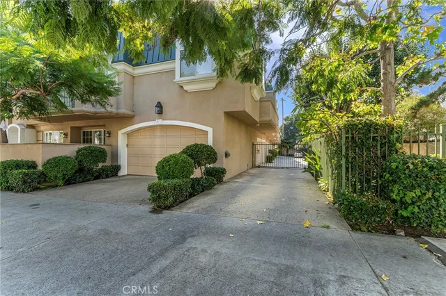 a view of a house with a street