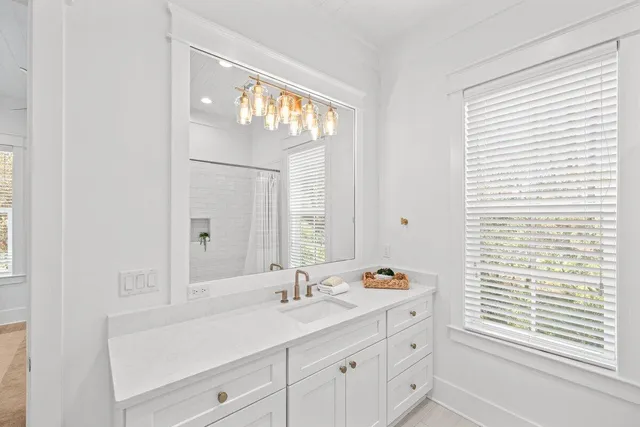 a kitchen with stainless steel appliances a sink stove and refrigerator