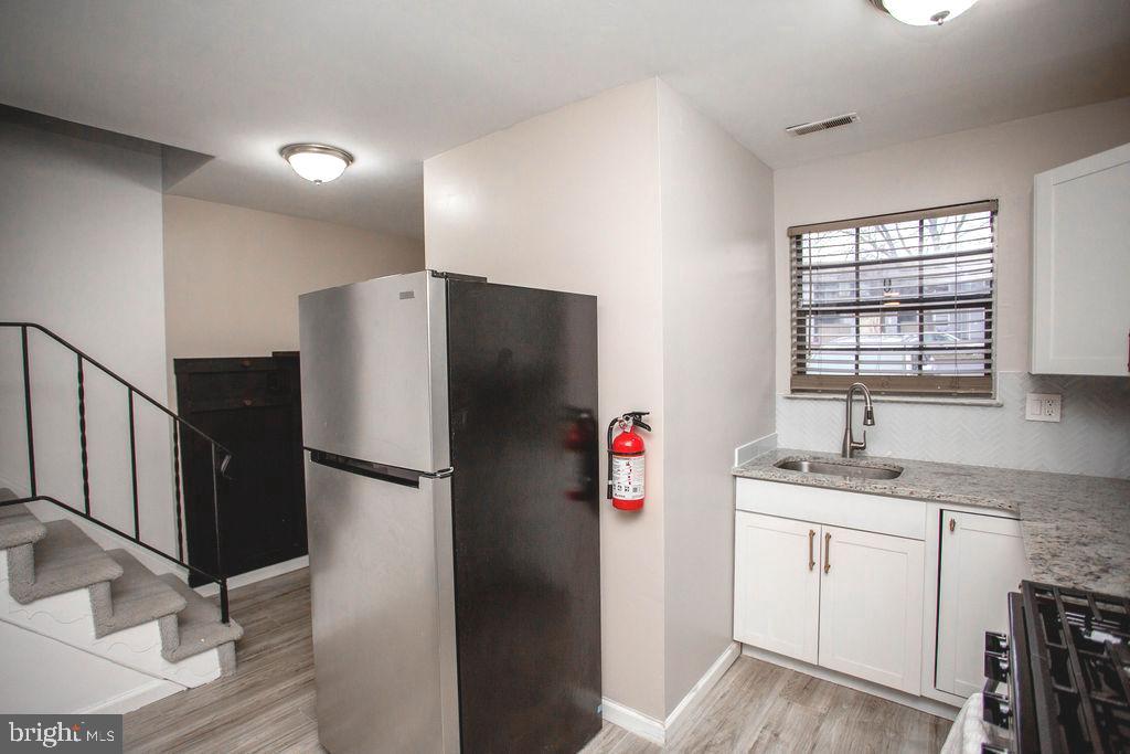 35 Via Cascata Drive Clementon, NJ 08021 - Photo 12 of 43 a kitchen with appliances cabinets and a sink