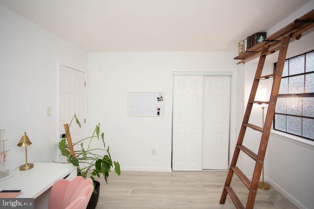 35 Via Cascata Drive Clementon, NJ 08021 - Photo 35 of 43 a view of a hallway with furniture and wooden floor