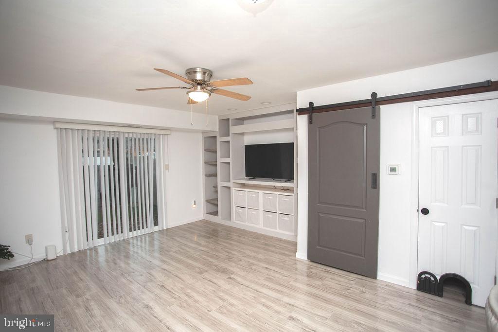35 Via Cascata Drive Clementon, NJ 08021 - Photo 4 of 43 a view of a livingroom with a flat screen tv