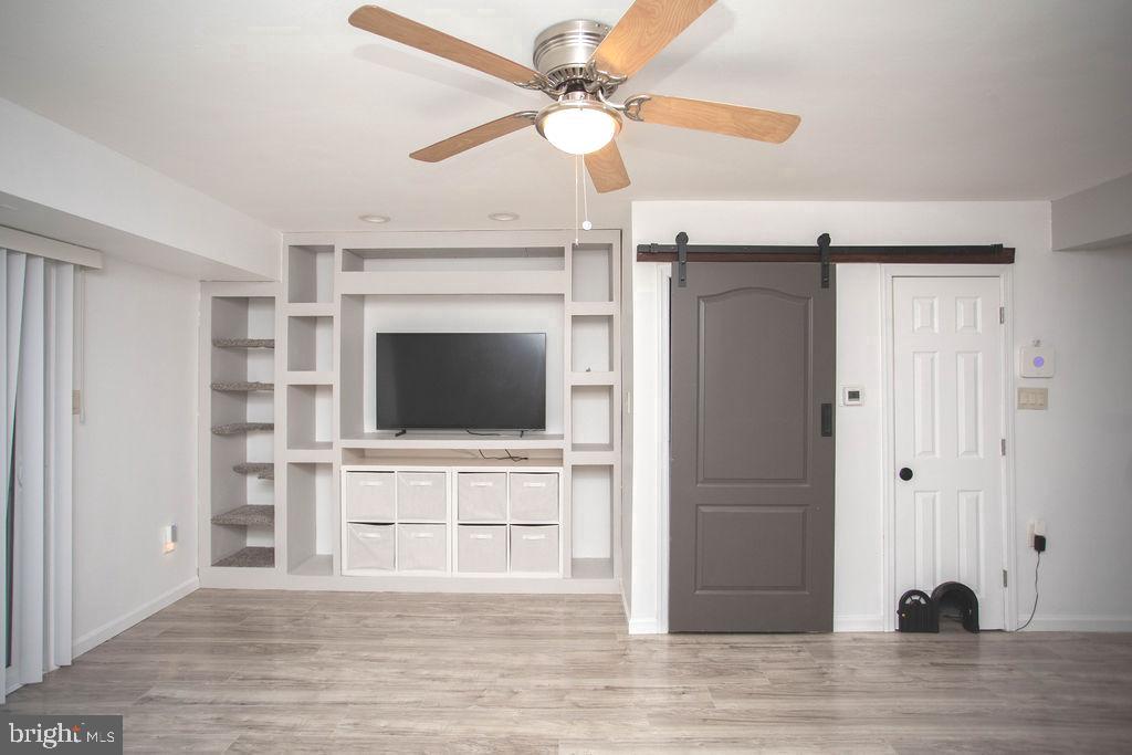 35 Via Cascata Drive Clementon, NJ 08021 - Photo 5 of 43 a view of a livingroom with an empty space & a ceiling fan