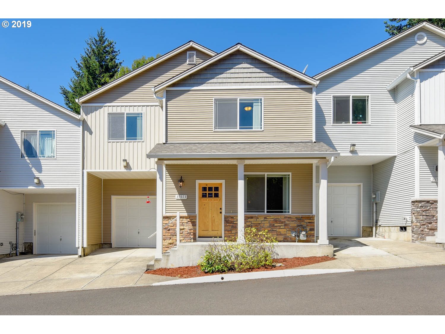 39573 Dubarko Road Sandy, OR 97055 - Photo 1 of 18 a front view of a house with a yard