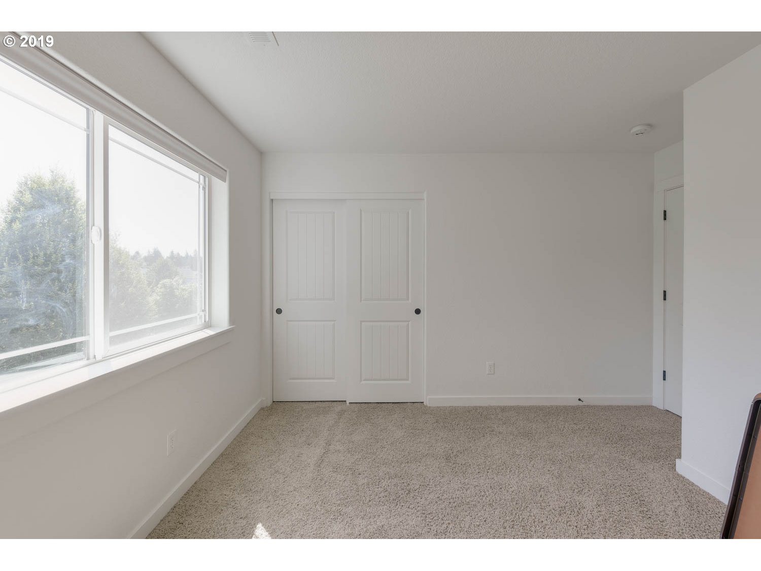 39573 Dubarko Road Sandy, OR 97055 - Photo 16 of 18 a view of an empty room with a window