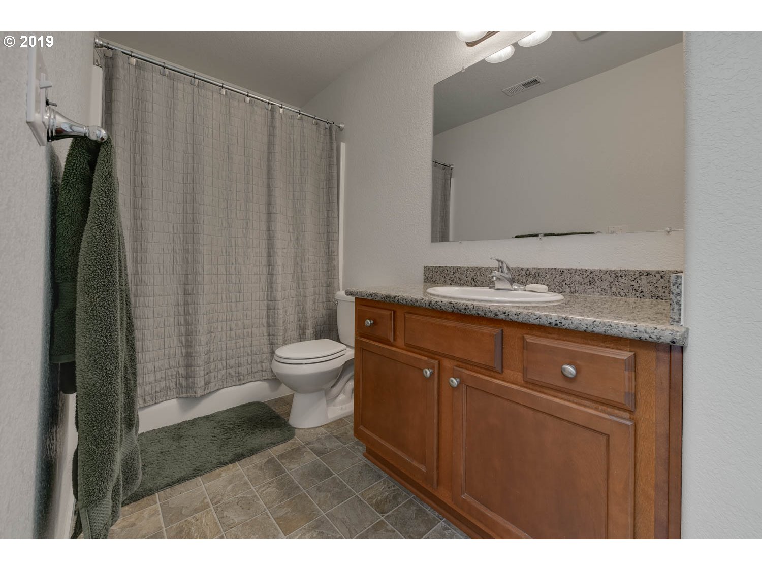 39573 Dubarko Road Sandy, OR 97055 - Photo 17 of 18 a bathroom with a sink a toilet and shower