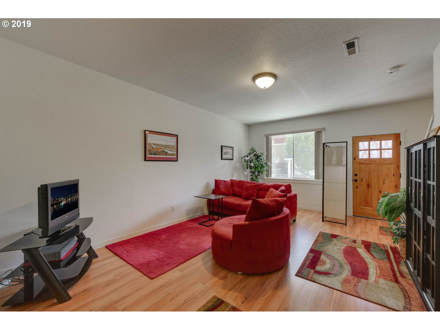 39573 Dubarko Road Sandy, OR 97055 - Photo 6 of 18 a bedroom with furniture and a window