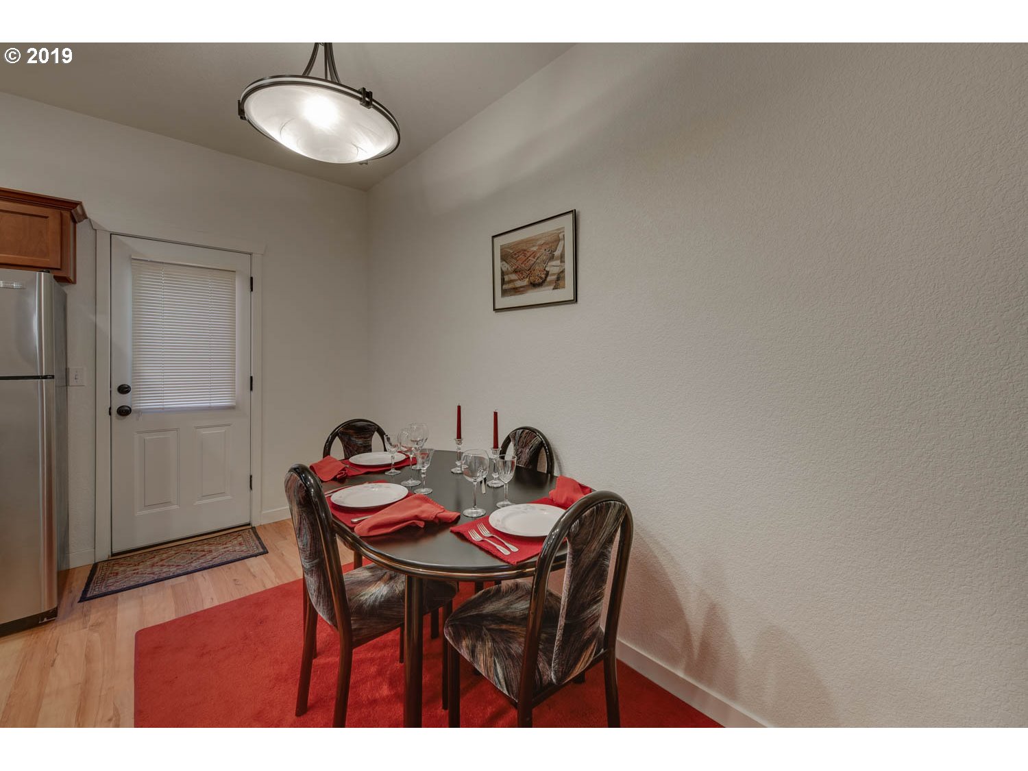 39573 Dubarko Road Sandy, OR 97055 - Photo 7 of 18 a view of a dining room with furniture and wooden floor