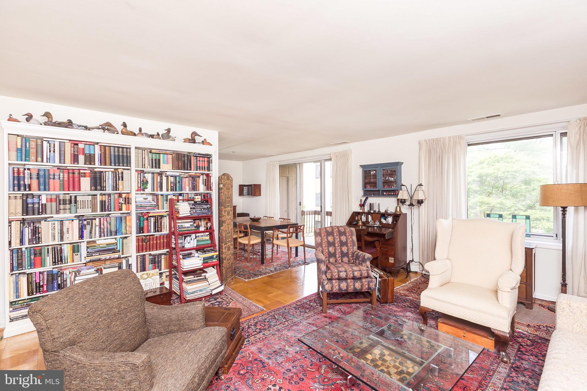 4 Cross Keys Road, Unit 4D Baltimore, MD 21210 - Photo 7 of 32 Bright living room with a wall of built-ins
