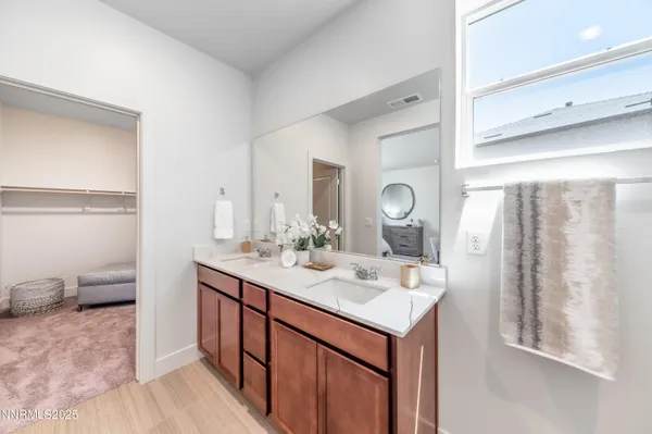 a bathroom with a toilet and a sink