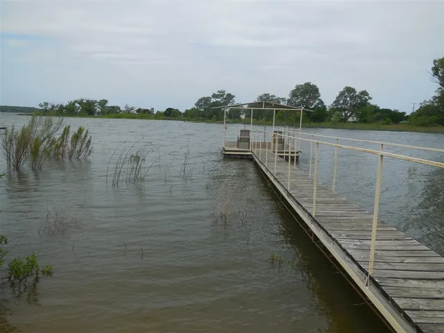 a view of a lake with a large mountain