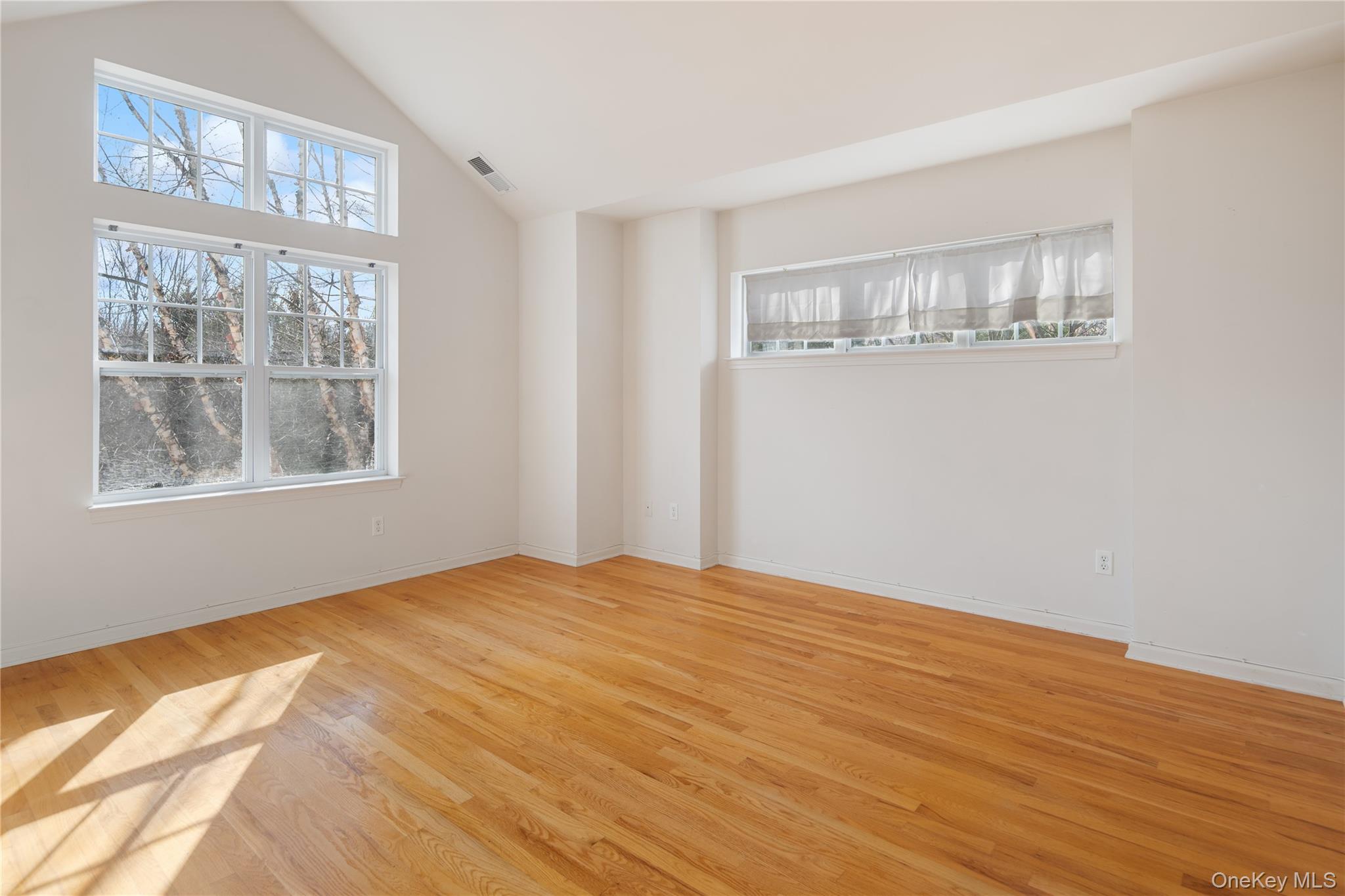 121 Northview Court Peekskill, NY 10566 - Photo 16 of 30 The second bedroom is also spacious with an ensuite bath, large windows, high ceilings, a closet