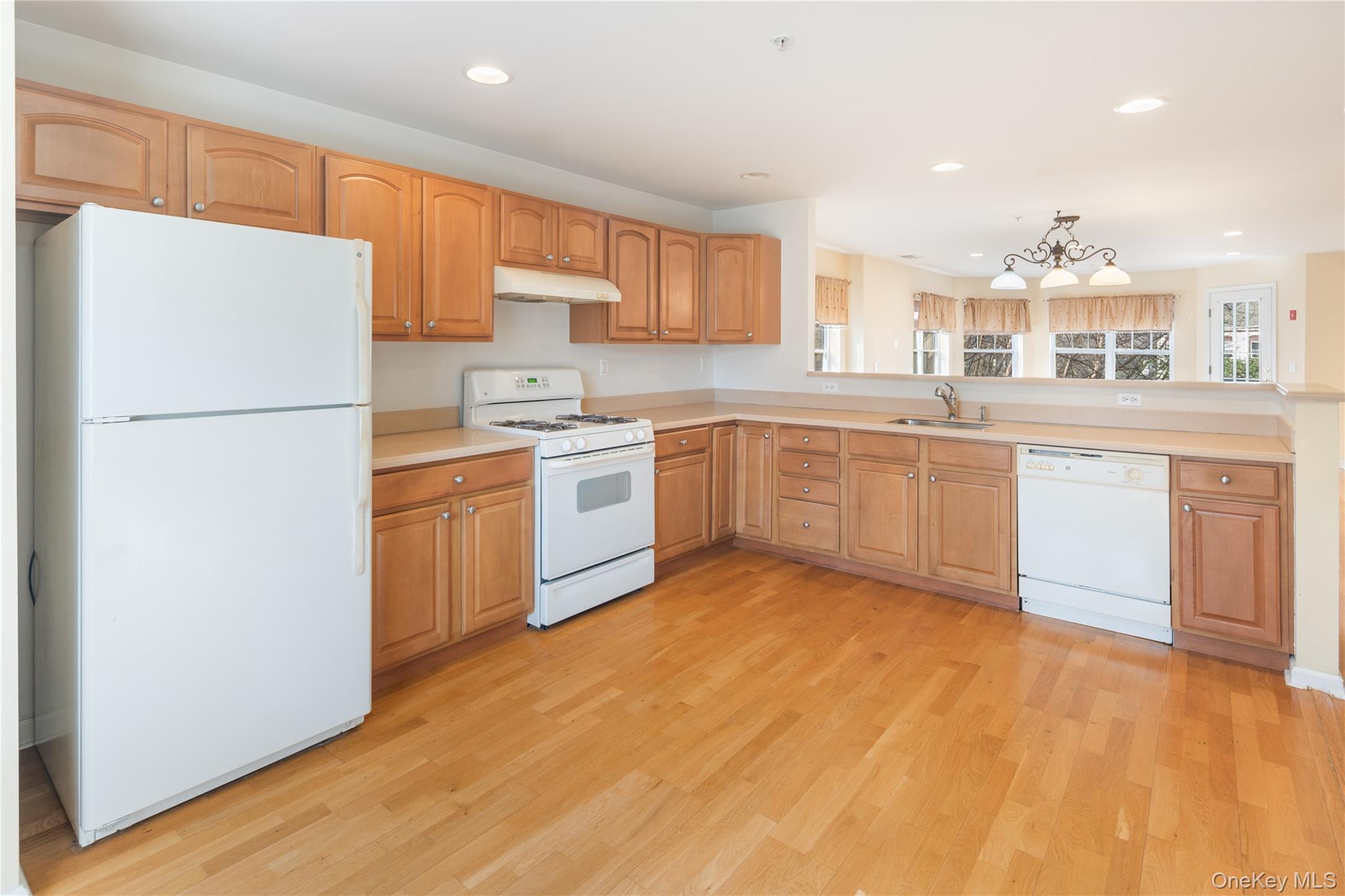 121 Northview Court Peekskill, NY 10566 - Photo 10 of 30 kitchen showing living room in background