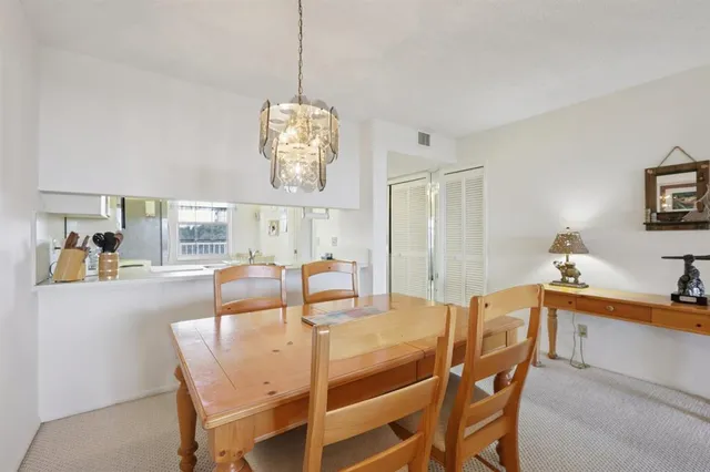 a kitchen with a sink cabinets and appliances