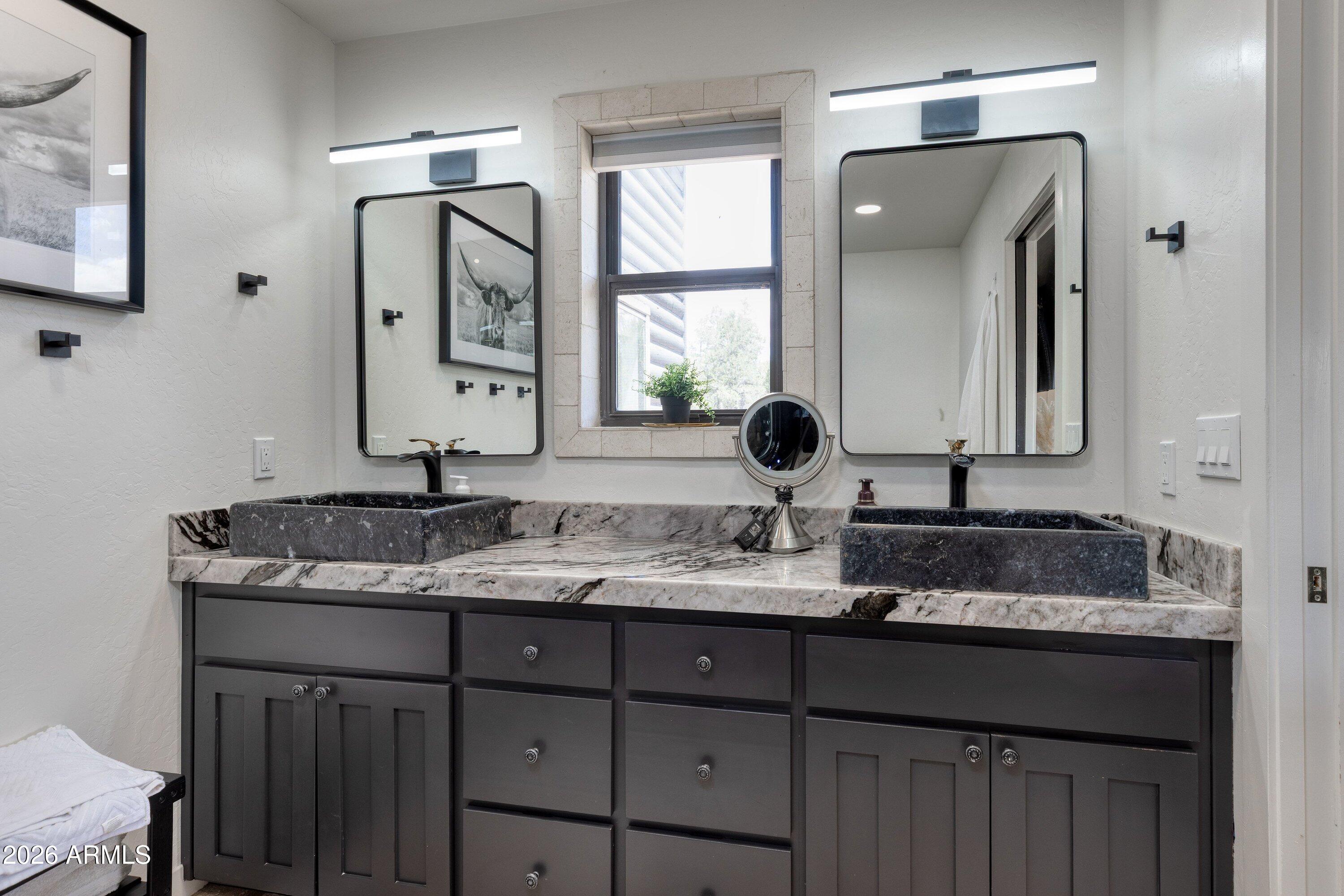 5182 Pinedale Wash Road Pinedale, AZ 85934 - Photo 22 of 54 a bathroom with a granite countertop sink double and mirror