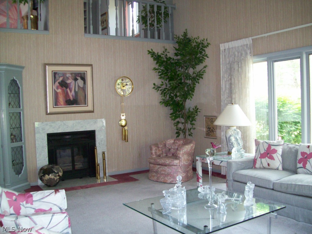 3883-2 Lander Road, Unit Q2 Chagrin Falls, OH 44022 - Photo 4 of 22 Living room w/see thru fireplace to family room